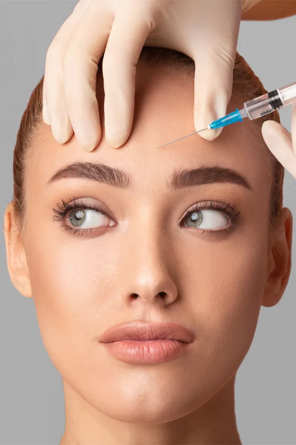 Botox-Treatment Close up of a woman with receiving a Botox injection in her brow from Nonkulie Dladla, M.D. in Manhattan.
