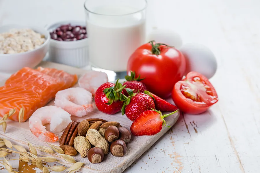 Food-Allergies-Clinic A board of foods like nuts, shellfish, and dairy, that are commonly associated with allergies. Get treatment for food allergies from Nonkulie Dladla, M.D. in Manhattan.