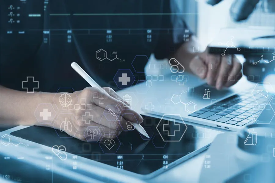 Health-Conditions-Treated-Doctor Close-up of a medical professional using a laptop and tablet, with illustrated medical symbols overlayed on the image, symbolizing health conditions treated by Nonkulie Dladla, M.D. in Manhattan.