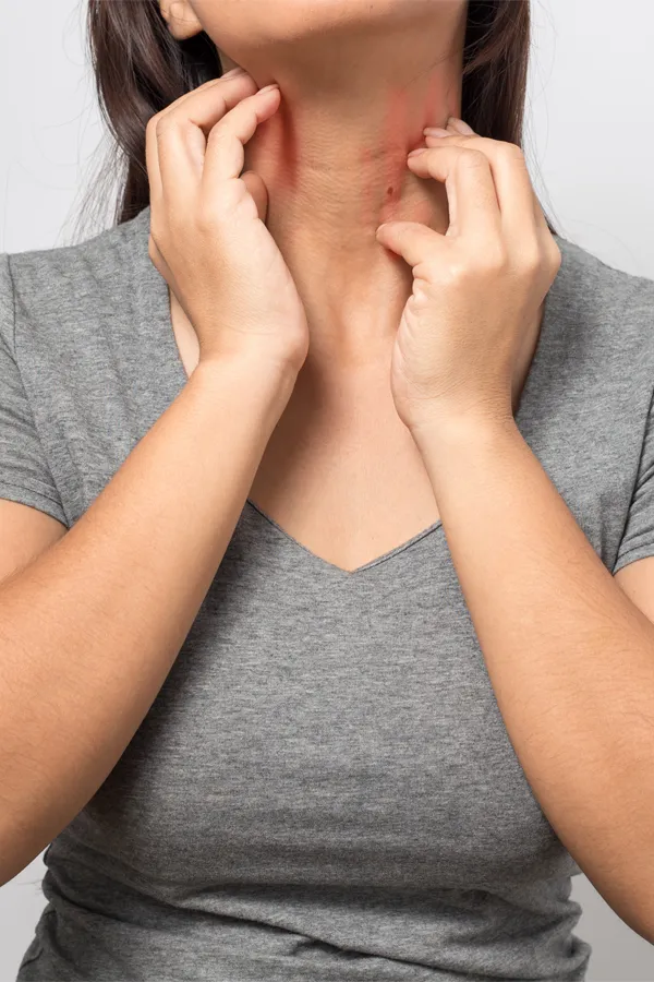 Celiac-Disease-Specialist Close up of a stack of bread slices on a cutting board with a woman's hands behind them, refusing to eat. Get help for Celiac Disease from Nonkulie Dladla, M.D. in Manhattan.