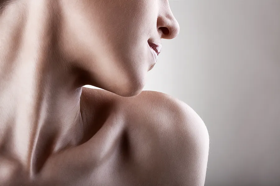 Radiesse-Filler-Clinic A woman with smooth tight skin and a smooth jawline. Get Radiesse filler treatment from Nonkulie Dladla, M.D. in Manhattan.