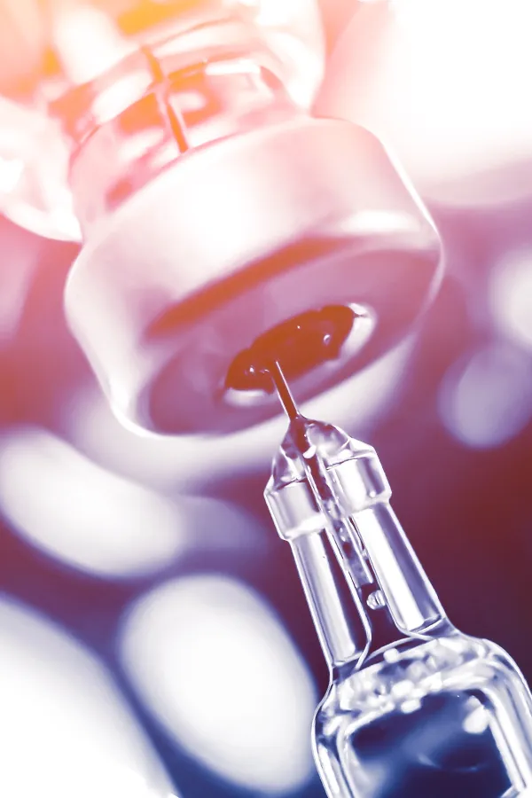 Vitamin-B-Injection-Treatment A syringe drawing fluid from a vial. Get Vitamin B Injections from Nonkulie Dladla, M.D. in Manhattan.