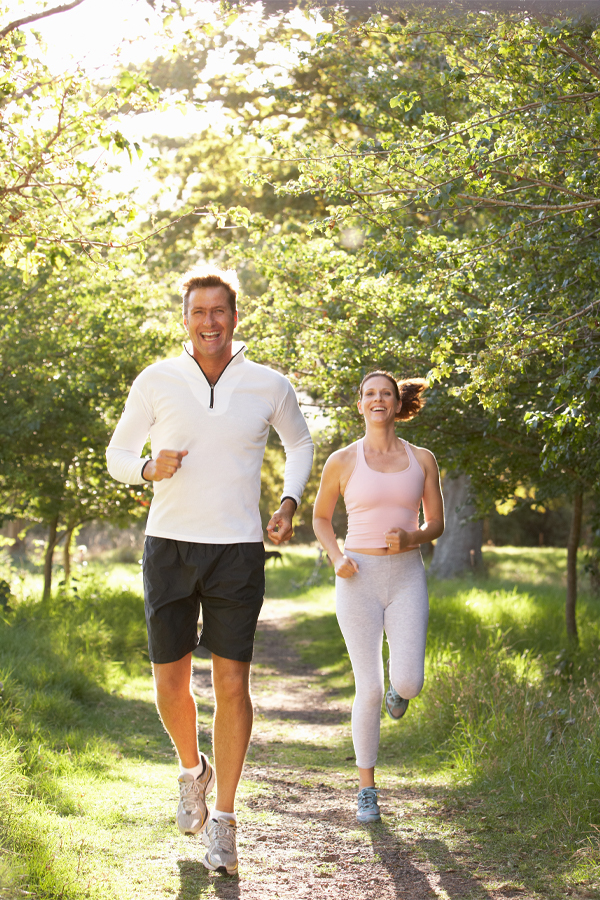 regenerative-medicine-treatments Active couple jogging outdoors, representing improved mobility, energy, and recovery through regenerative medicine treatments. Schedule your regenerative medicine consultation with Nonkulie Dladla, M.D. in Manhattan.